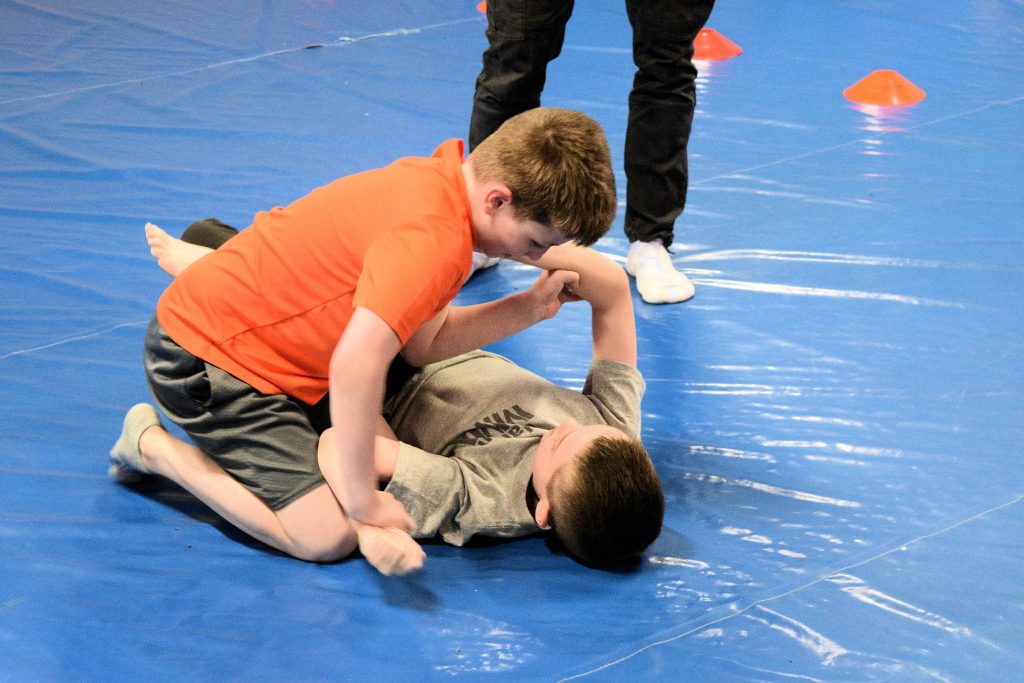 Brazilian Jiu-Jitsu athletes competing at a local tournament